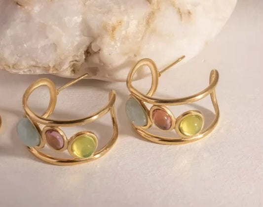 Close-up of Orek Radiant Harmony Crystal Earrings earrings detail, a cluster of multicolour crystals set in