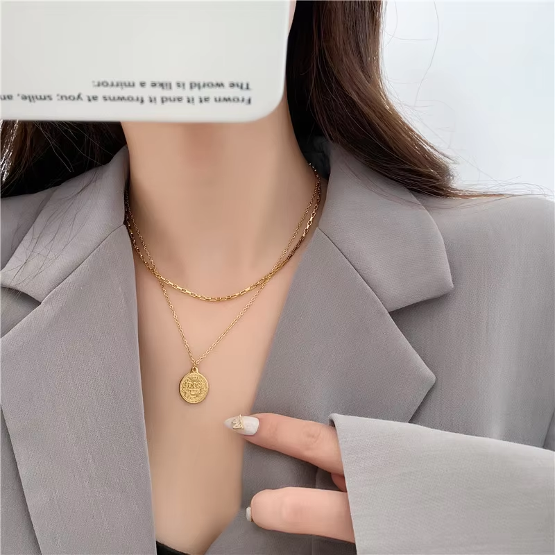 Detailed view of Orek Layered Gold Coin Pendant Necklace showing premium 2.5 micron gold plating