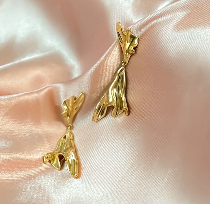 Sophisticated Irregularity: Golden Western Earrings for the Unconventional Spirit