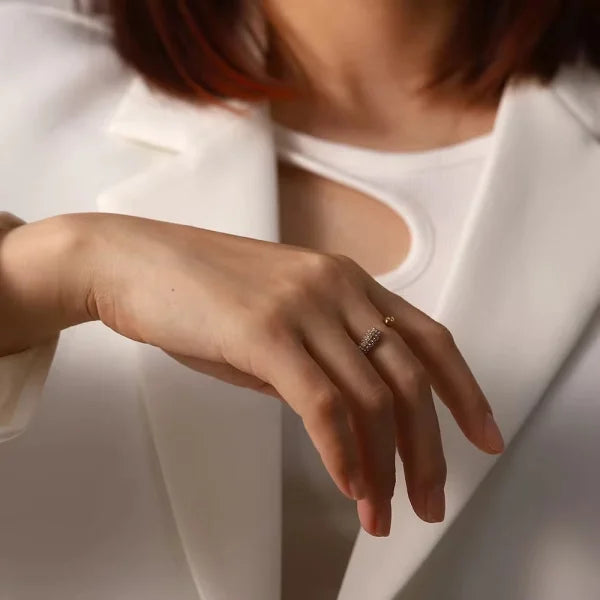 Close-up of Orek Liora Waterdrop Ring ring detail, an irregular, glossy waterdrop silhouett