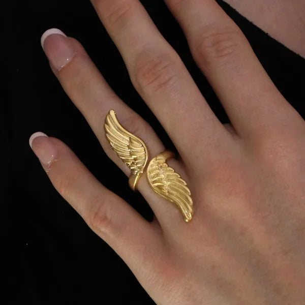Close-up of Orek Colomba Dove Wing Ring ring detail, a sculpted dove-wing silhouette, a retro