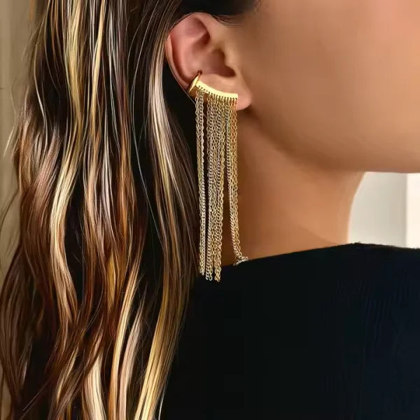 Close-up of Orek Arelia Mono Fringe Cuff earrings detail, a two-tone chain fringe worn as a single