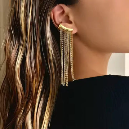 Close-up of Orek Arelia Mono Fringe Cuff earrings detail, a two-tone chain fringe worn as a single