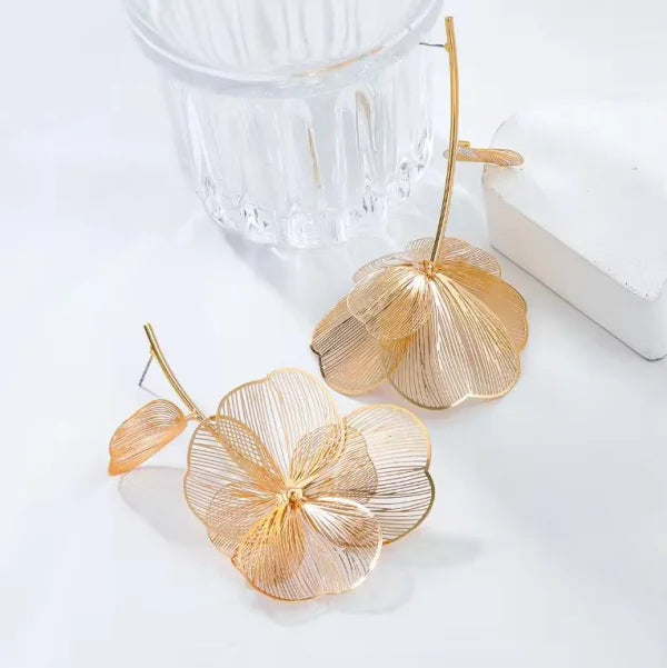 Orek Ivra Bold Flora Dangler earrings styled with everyday outfit