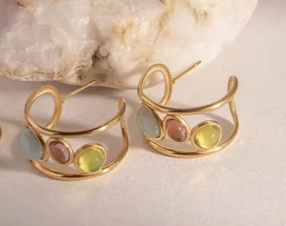 Close-up of Orek Radiant Harmony Crystal Earrings earrings detail, a cluster of multicolour crystals set in