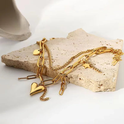 Close-up of Orek Luxura Bead Chain Bracelet bracelet detail, a double-layer chain paired with a row o