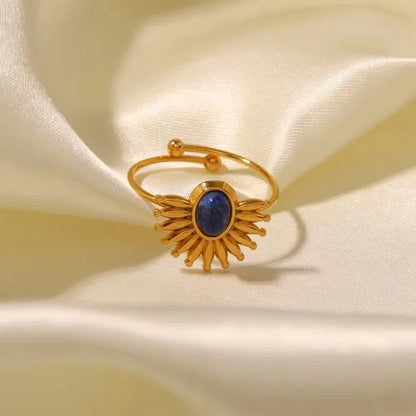 Close-up of Orek Evara Blue Ring ring detail, a bold open band set with a rich lapis l