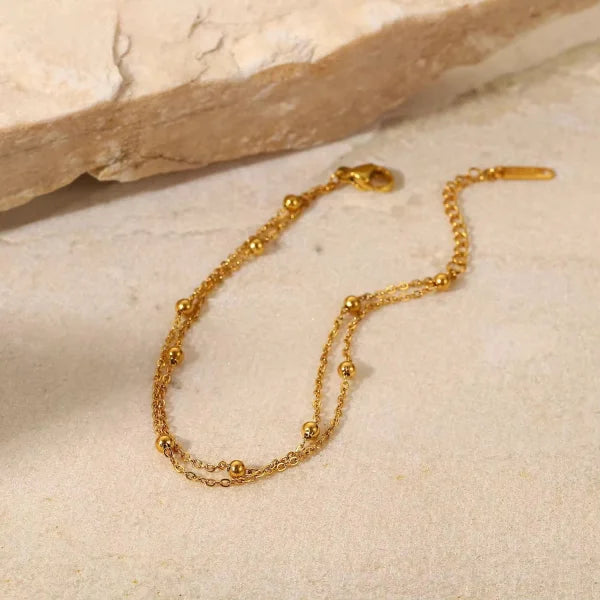 Woman wearing Orek Ira Double Chain Bracelet bracelet