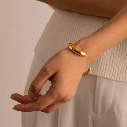 Close-up of Orek Mira Hip-Hop Bangle bracelet detail, an irregular, chunky silhouette with a b