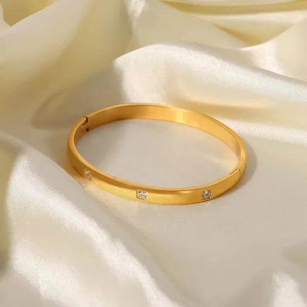 Orek Luna Luxe Gold Bangle bracelet styled with everyday outfit