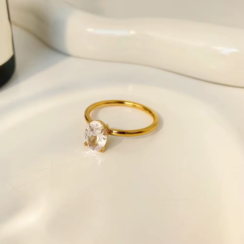 Woman wearing Orek Elouise Round Zircon Ring ring