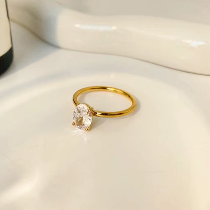 Woman wearing Orek Elouise Round Zircon Ring ring