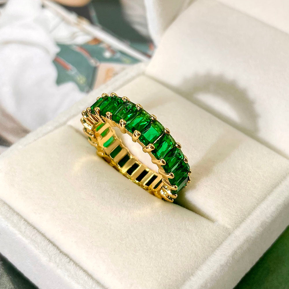 Orek Emera Emerald Zirconia Ring ring on jewellery display, a geometric setting showcasing an emeral