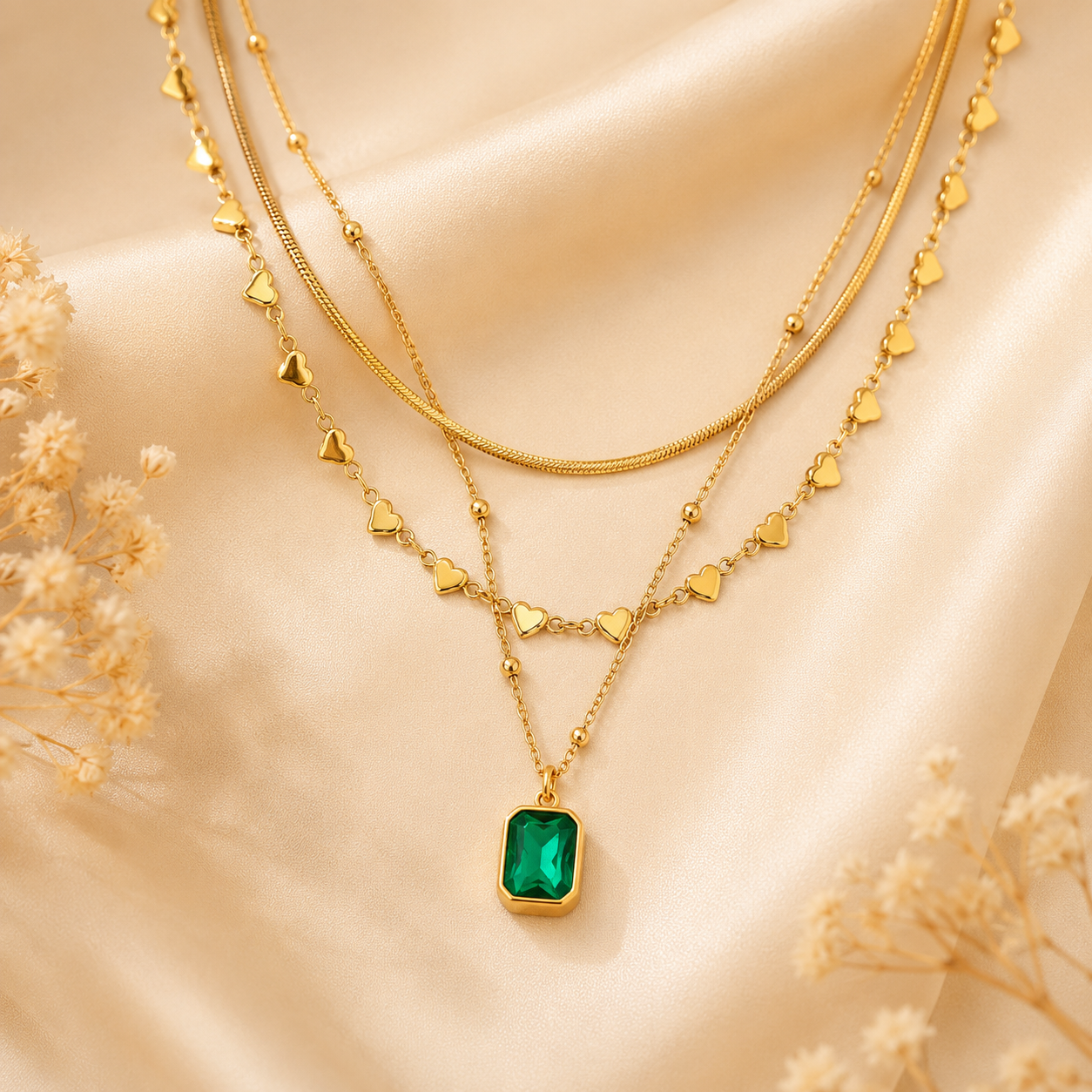 Noira Heart Layers Necklace in 18K gold plated premium stainless steel by Orek with layered heart pendant design.