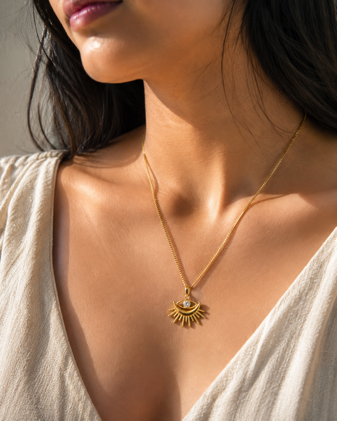 Close-up of Orek Evara Guard Charm Necklace necklace detail, a vintage-inspired evil eye charm pendan