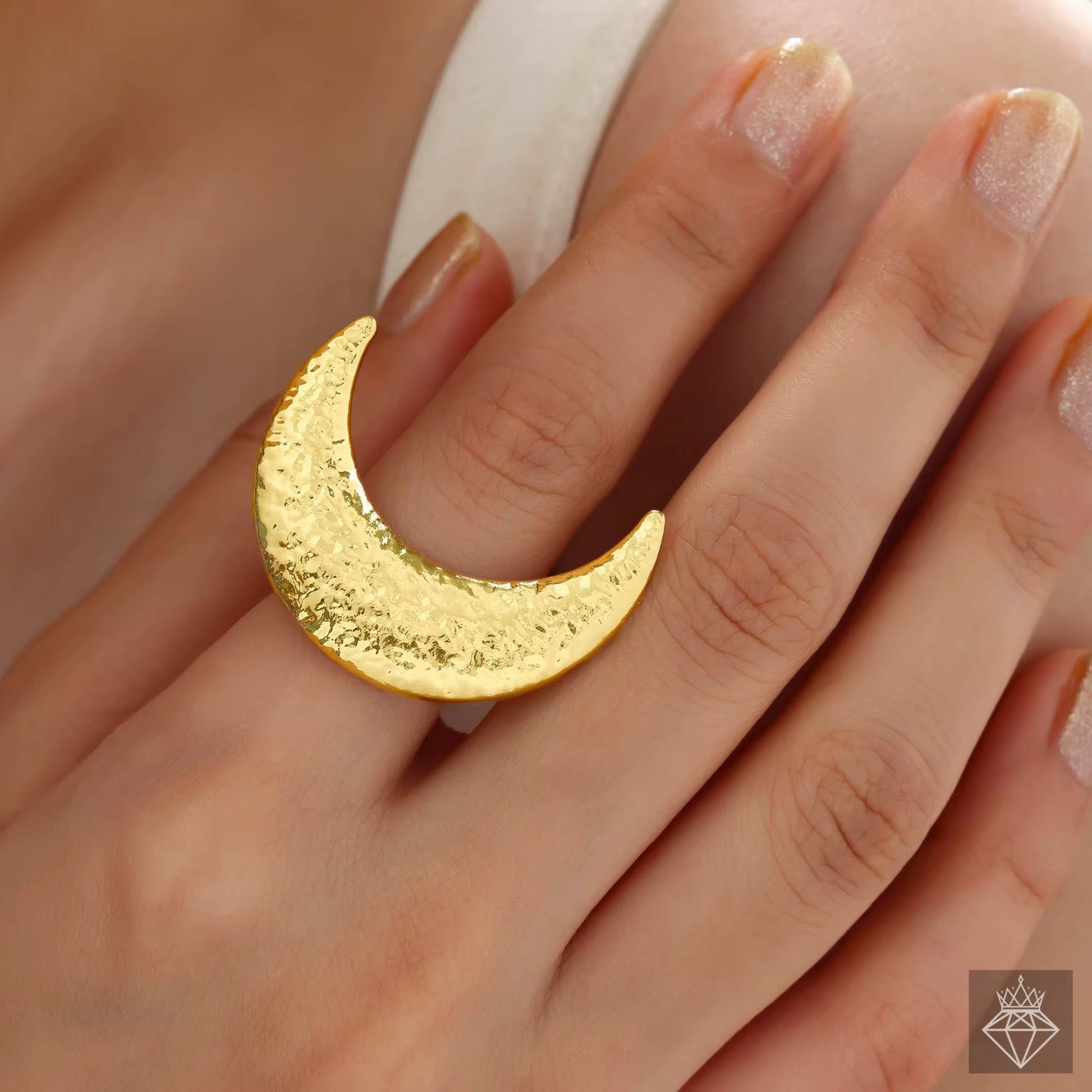 Woman wearing Orek Selene Big Moon Ring ring