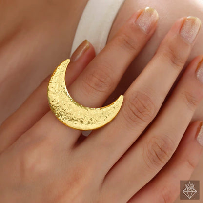Woman wearing Orek Selene Big Moon Ring ring