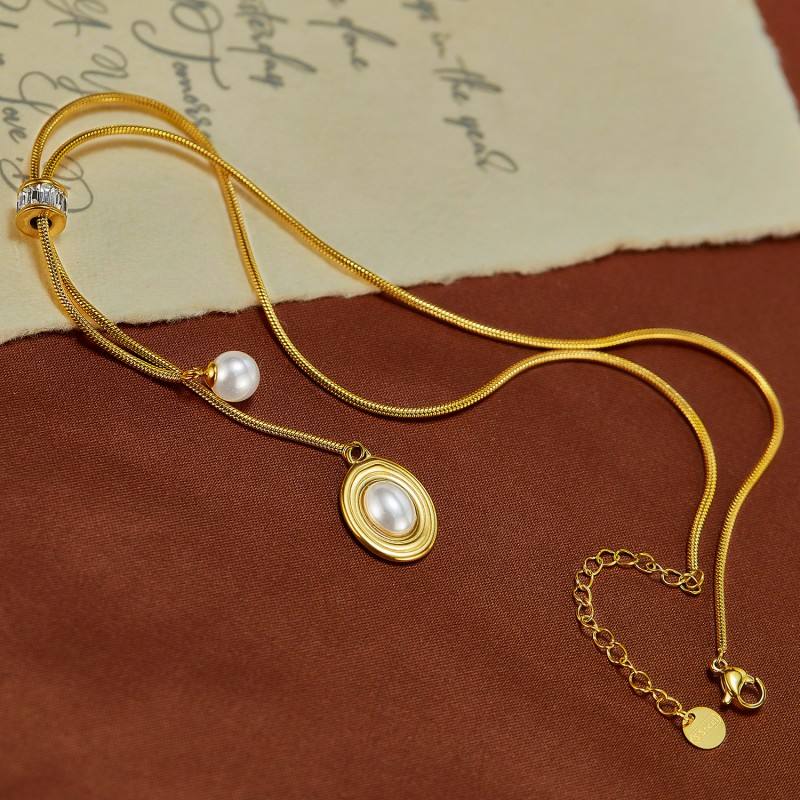 Close-up of Orek Evara Pearl Oval Necklace, showing anti-tarnish gold plated finish