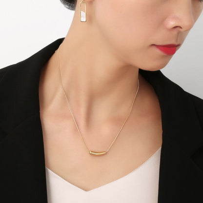 Orek Solyn Curved Arc Necklace necklace styled with everyday outfit