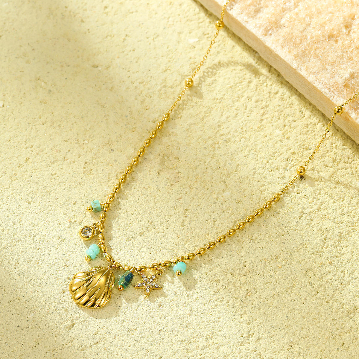 Woman wearing Orek Ciela Ocean Charm Necklace necklace