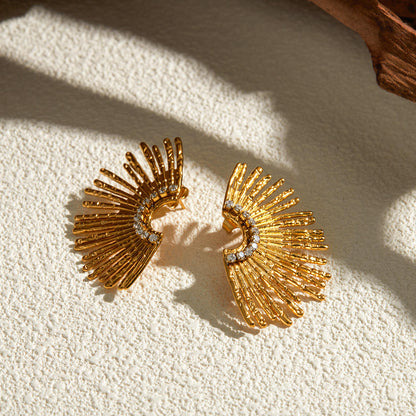 Woman wearing Orek Ivra Golden Petal Earring earrings