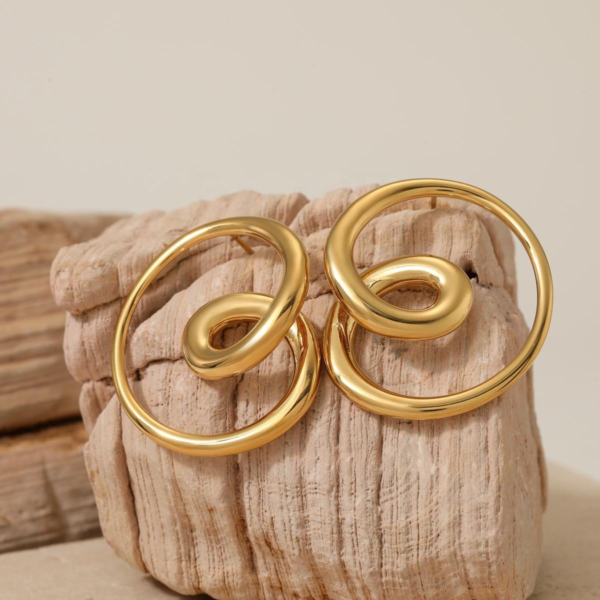 Close-up of Orek Eternal Love Spin Earrings earrings detail, a heart silhouette designed to spin free