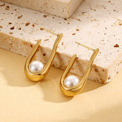 Orek Era U Shell Pearl Earrings earrings styled with everyday outfit