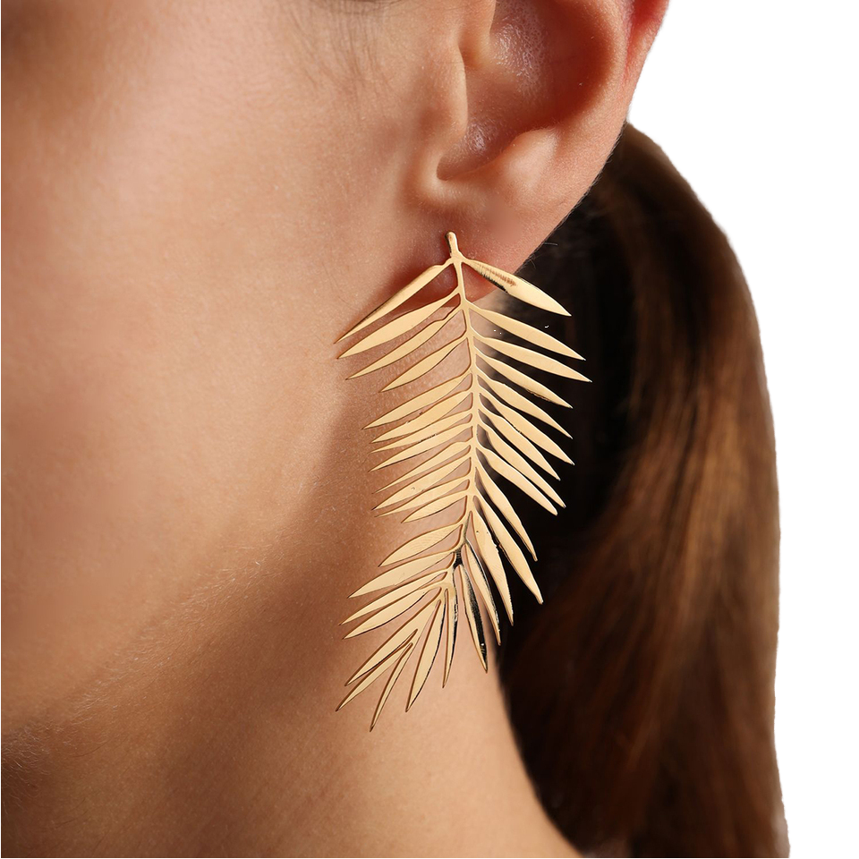 Woman wearing Orek Harmony Leaf Pair Earrings earrings