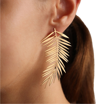 Woman wearing Orek Harmony Leaf Pair Earrings earrings