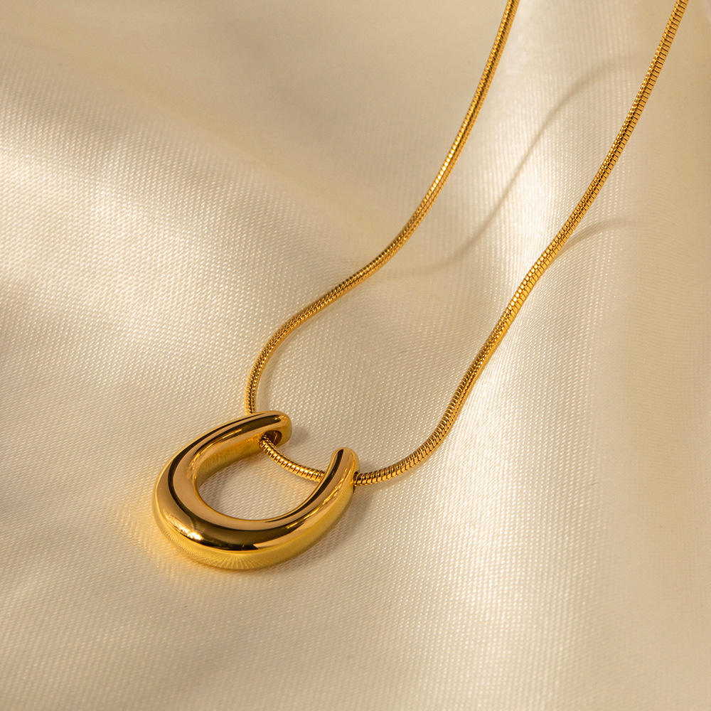 Golden Crescent Glow – Minimalist 18K Gold Plated Crescent Curve Pendant Necklace