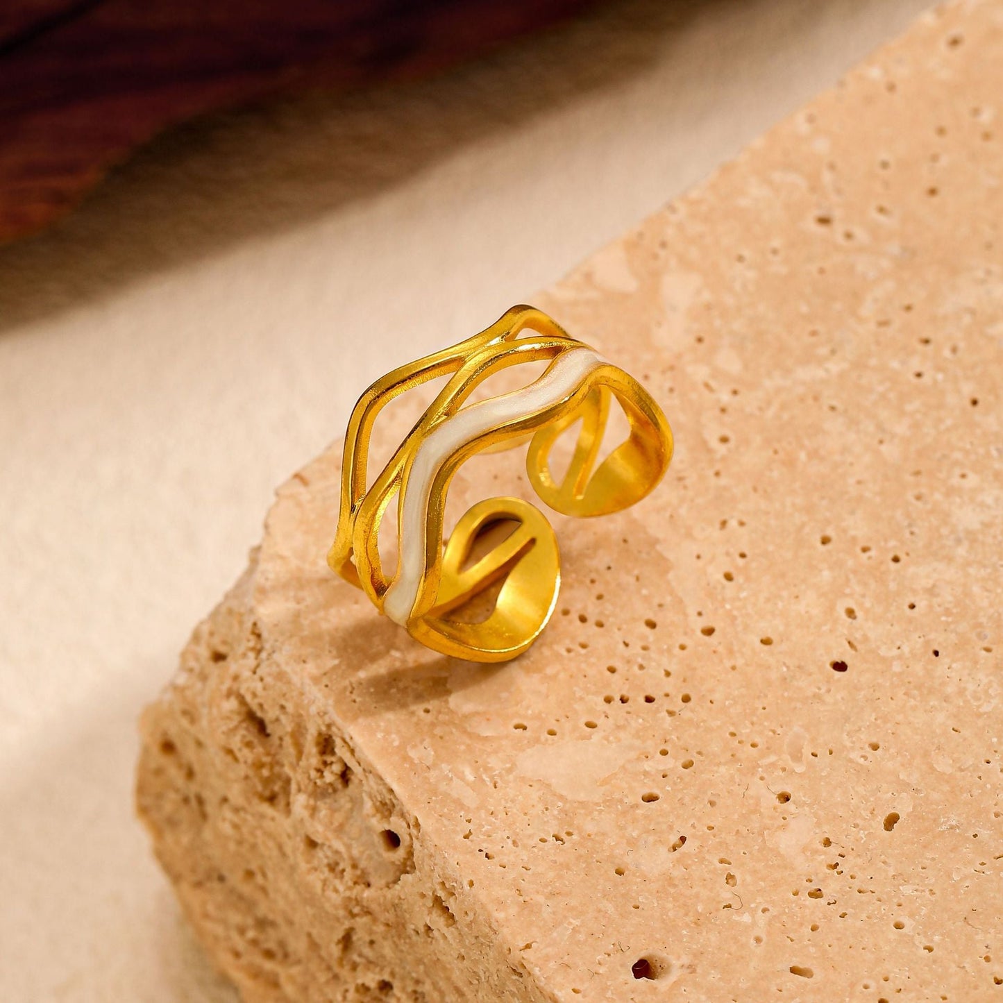 Close-up of Orek Petalia Pearl Flower Ring ring detail, a minimalist flower silhouette finished 