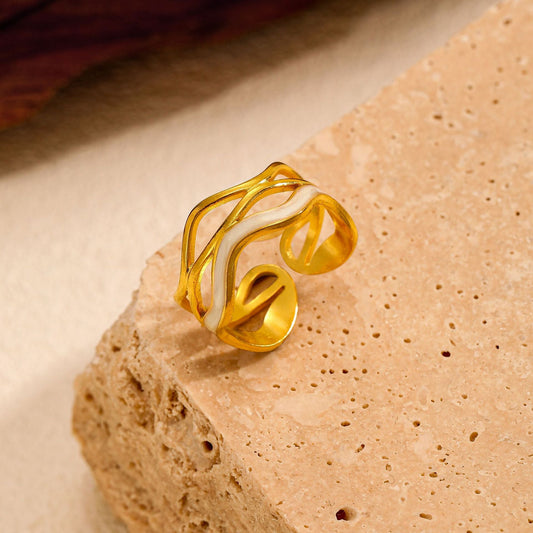 Close-up of Orek Petalia Pearl Flower Ring ring detail, a minimalist flower silhouette finished 