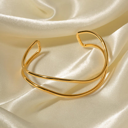 Orek Arelia Double Layer Bangle bracelet on jewellery display, two slim, parallel lines forming a minim
