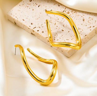 Orek Ciela Abstract Twist Dangler earrings styled with everyday outfit