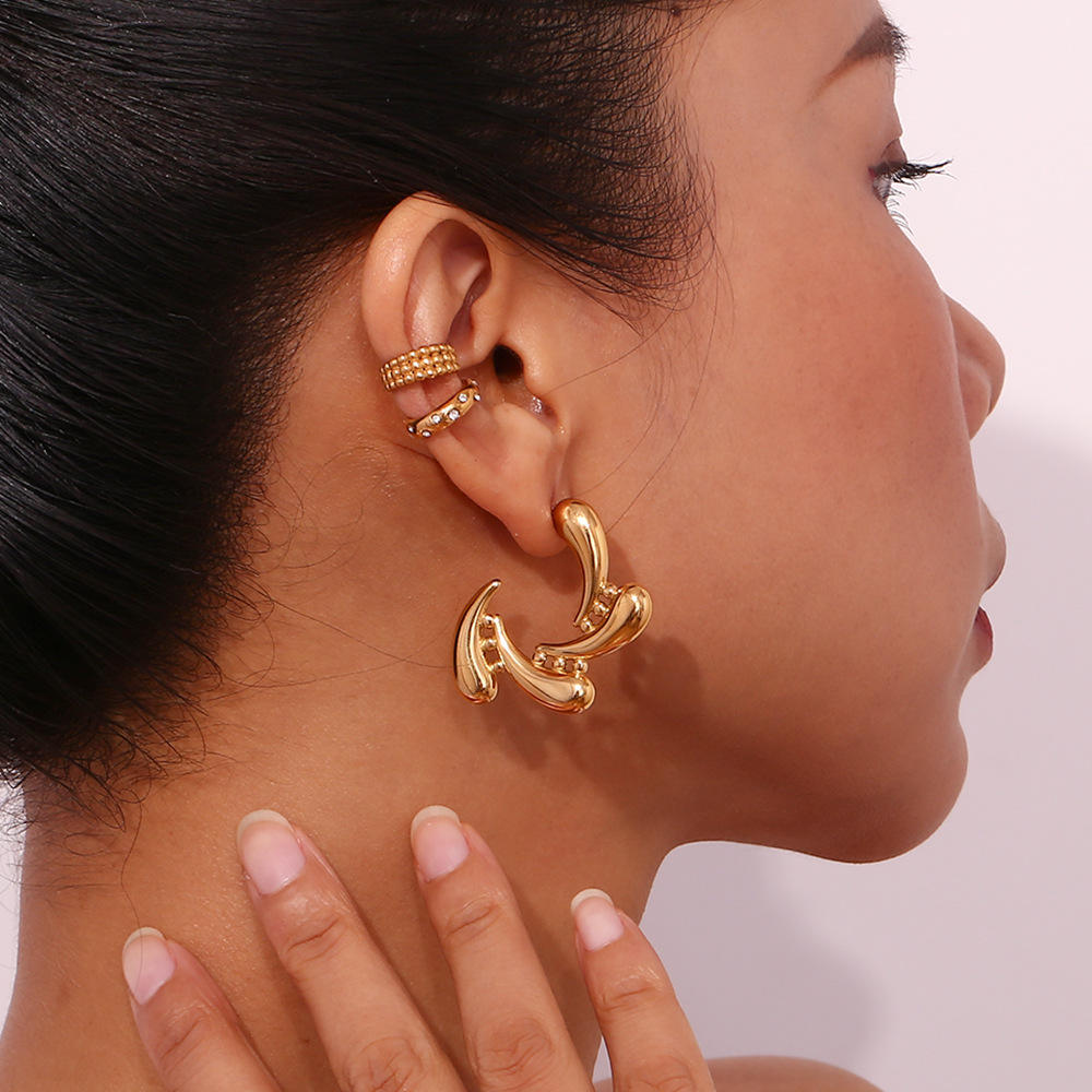 Woman wearing Orek Golden Bloom Drop Earrings earrings