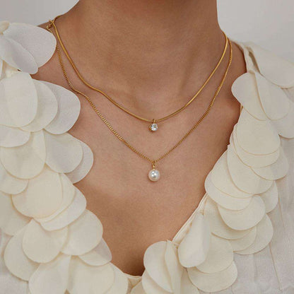 Woman wearing Orek Evara Twin Grace Necklace necklace
