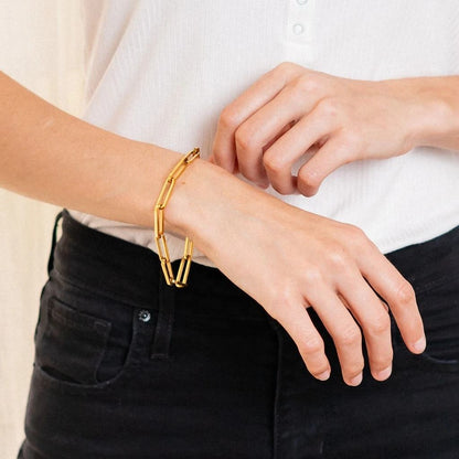 Woman wearing Orek Flat Paperclip Bracelet bracelet