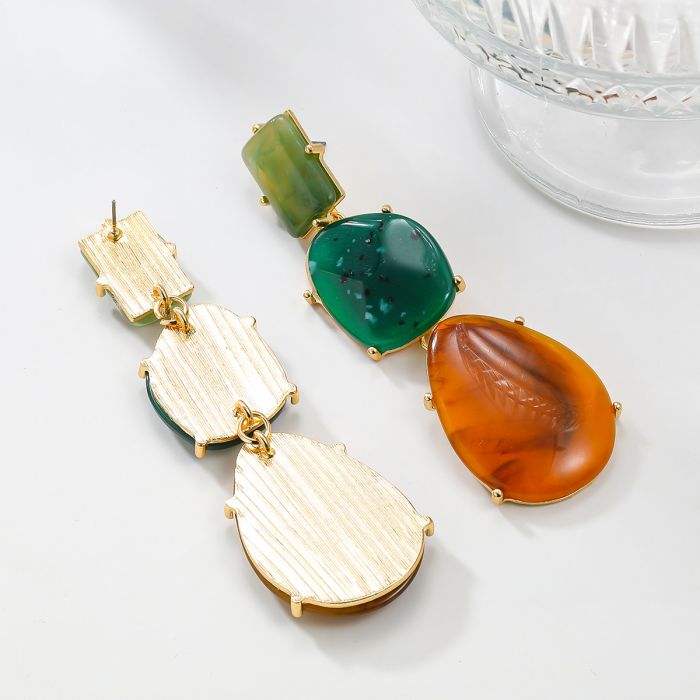 Woman wearing Orek Solene Vintage Teardrop Dangler earrings