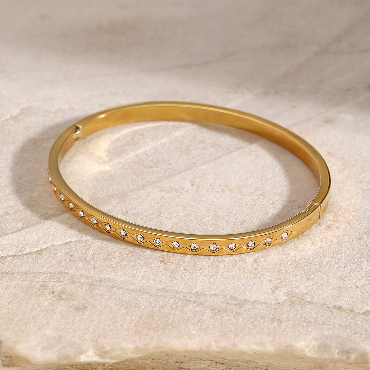 Orek Elyra Sparkle Clasp Bangle bracelet styled with everyday outfit