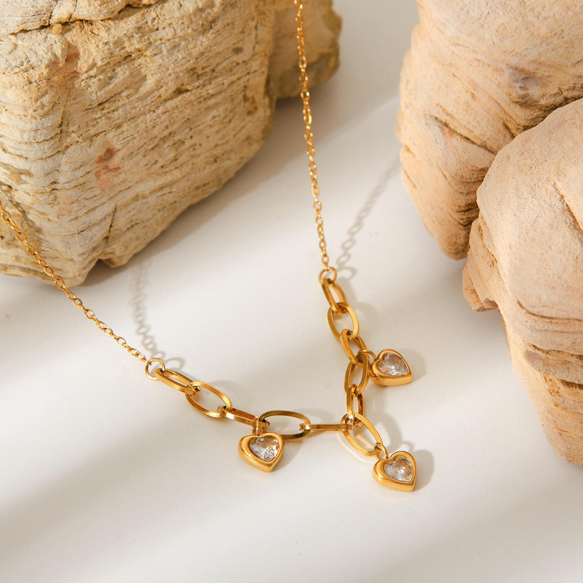 Woman wearing Orek Evara Heart Link Necklace necklace