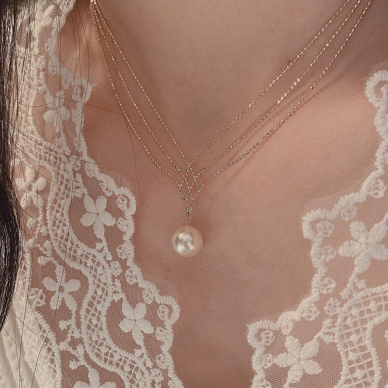 Orek Luna Siren Pearl Necklace worn — pendant necklaces for Festive