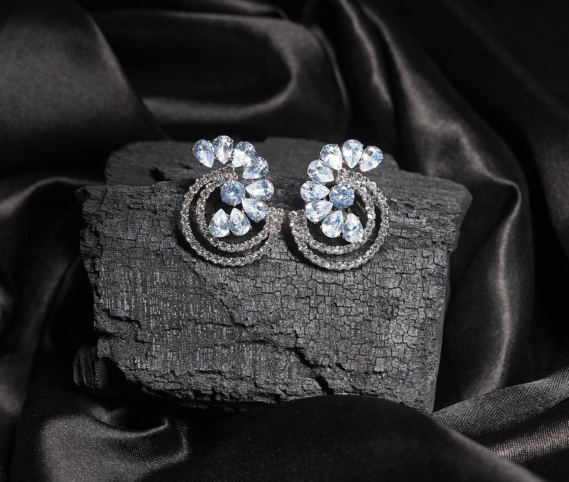 Model wearing Orek Mugdha Oval Diamond Stud Earrings