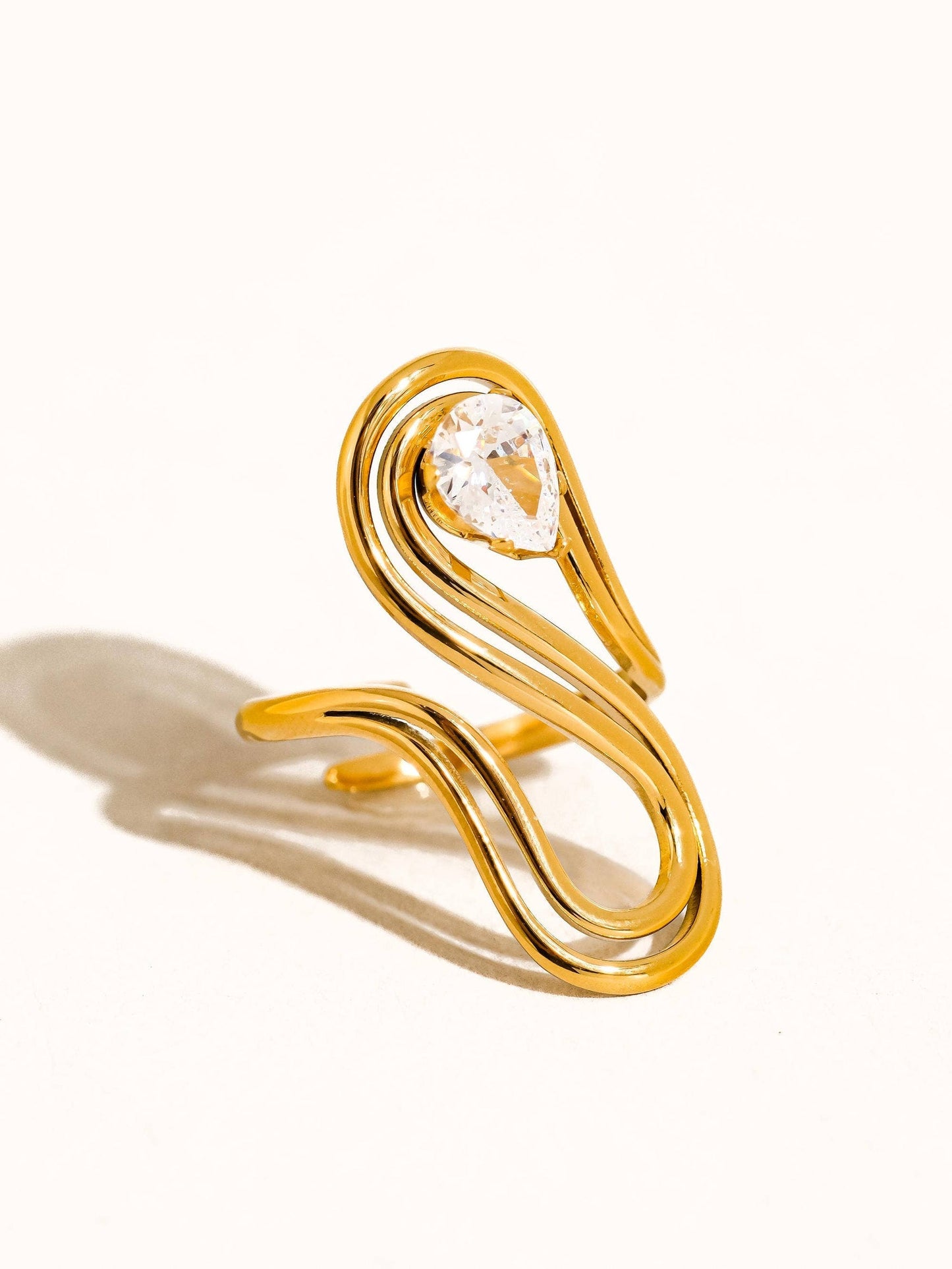 Close-up of Orek Aira Dual Form Ring, showing anti-tarnish gold plated finish