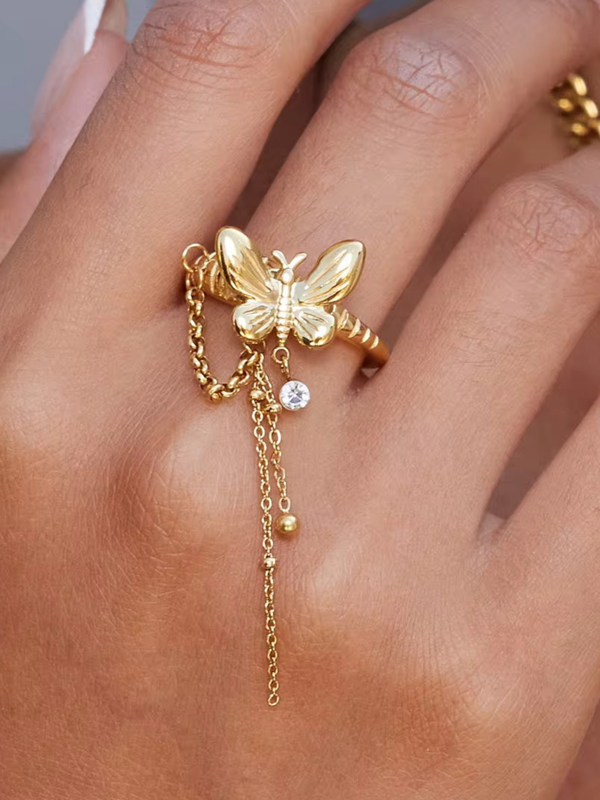 Woman wearing Orek Aiera Butterfly Ring ring