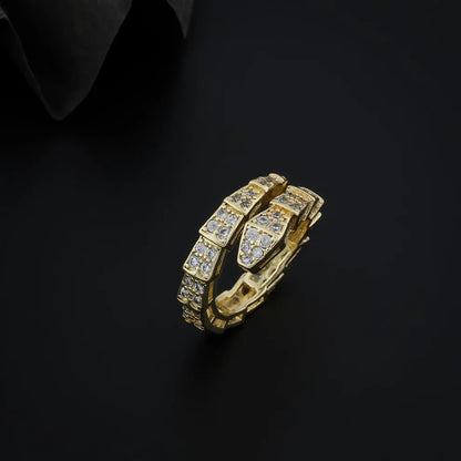 Orek Serpentia Snake Ring ring on jewellery display, a coiled snake silhouette with a texture