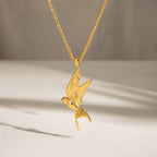 Close-up of Orek Ciela Dove Whisper Necklace, showing anti-tarnish gold plated finish