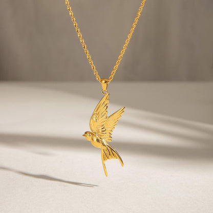 Close-up of Orek Ciela Dove Whisper Necklace, showing anti-tarnish gold plated finish