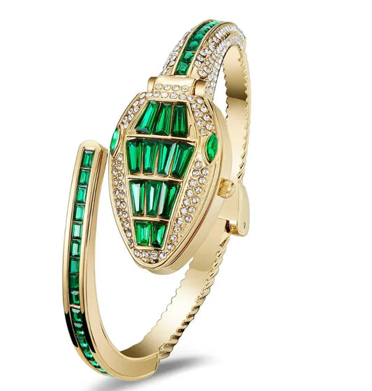 Orek Emerald Serpent Watch showing sculptural bracelet design and emerald green accents