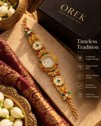 Rangmahal gold-tone traditional bracelet watch featuring a round ivory dial, intricate floral motifs, and multicolour red, green, blue, and white accents.