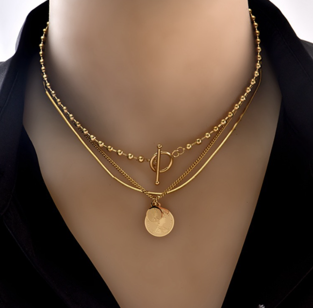Close-up of Orek Layered Gold Coin Pendant Necklace, showing anti-tarnish gold plated finish